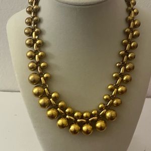 Costume gold bead like necklace